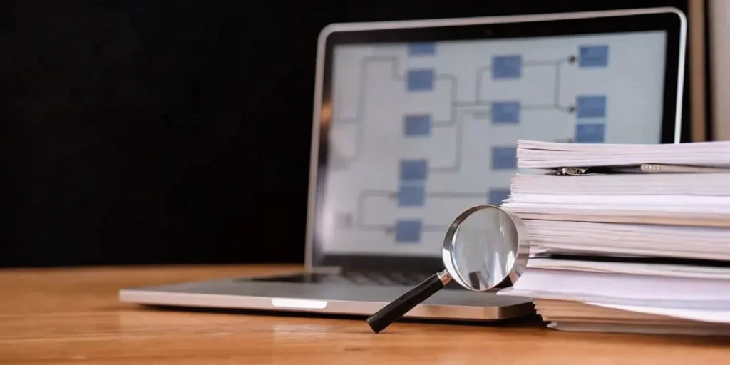 FDA compliance flowchart, documents, and magnifying glass.