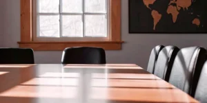 Conference room with a world map for planning a global regulatory strategy.