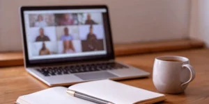 Laptop on a desk showing an online PCQI training course for food safety certification.