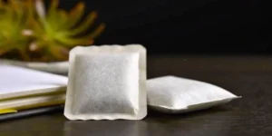 A can of nicotine pouches on a table, a product subject to strict government regulation.