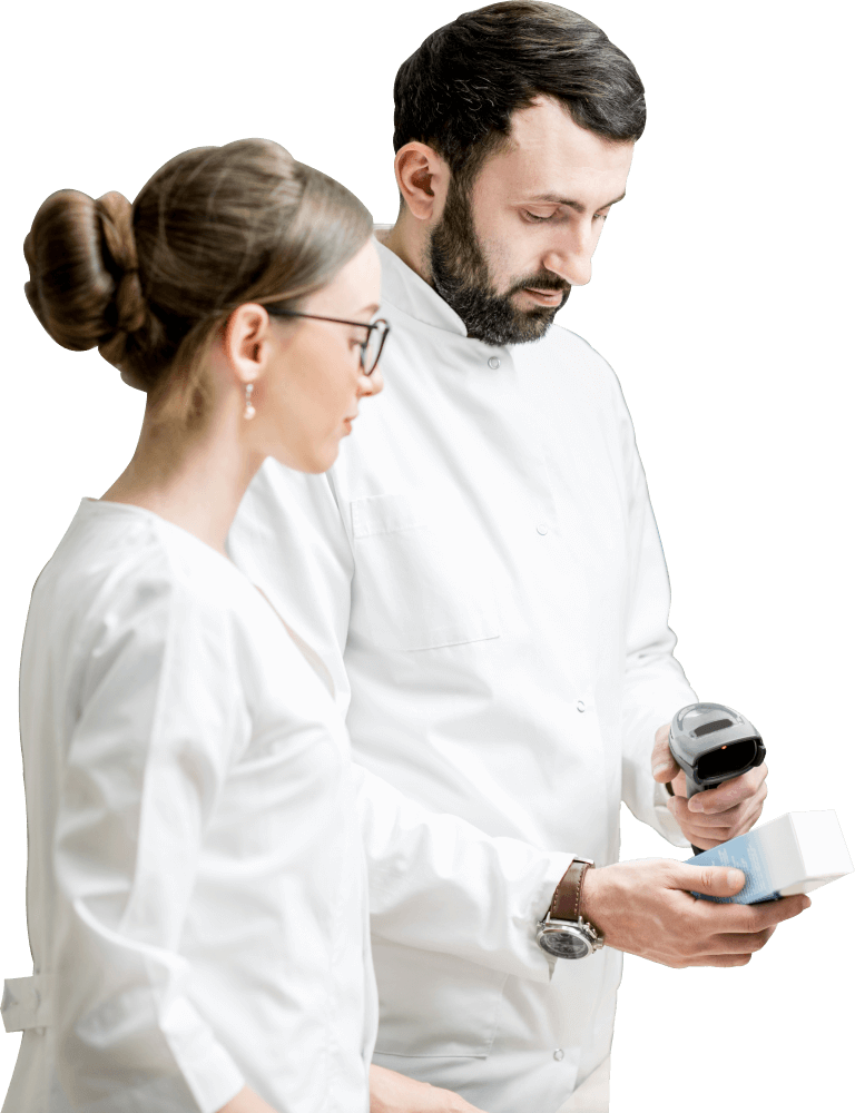 Two pharmacy professionals scanning a product box.