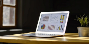 Analyzing charts on a laptop to choose an FDA regulatory compliance consulting service.