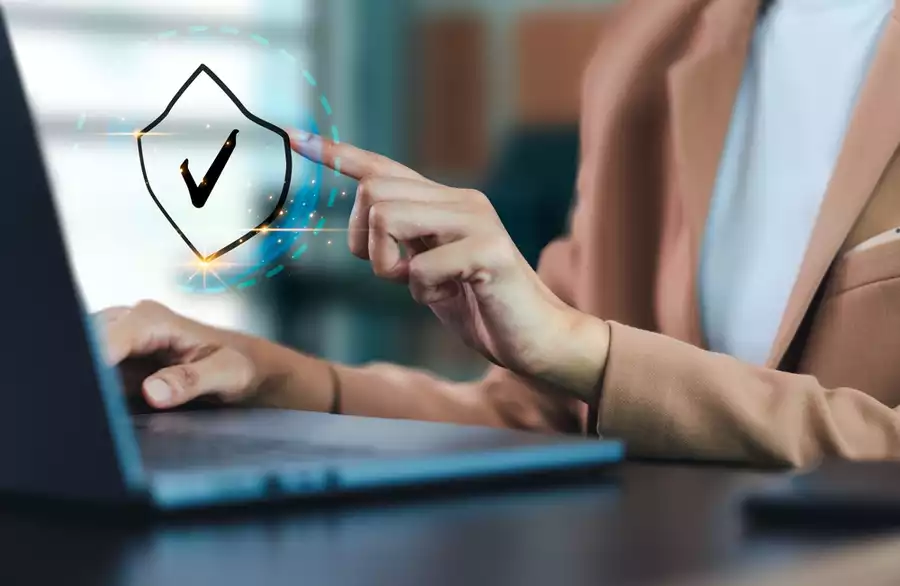 Virtual display of quality assurance in a business office in front of a computer with a business person touching the icon.