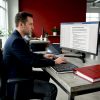 Engineer reviewing medical device compliance documents